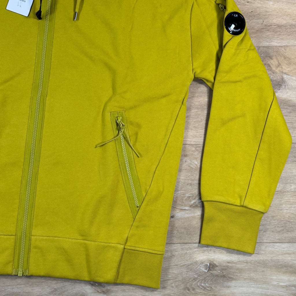 C.P. Company Diagonal Raised Zipped Lens Hoodie in Antique Moss - Yellow