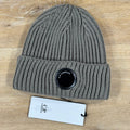 C.P. Company Extra Fine Merino Wool Lens Beanie in Fallen Rock - Beige