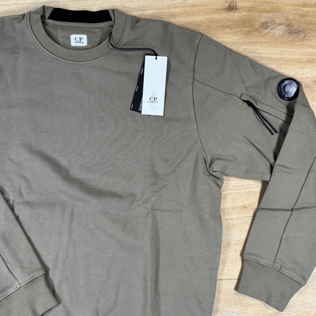 C.P. Company Diagonal Raised Fleece Crewneck Lens Sweatshirt in Fallen Rock - Beige