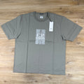 C.P. Company Mercerized Jersey Twisted Chest Logo T-Shirt in Fallen Rock - Beige