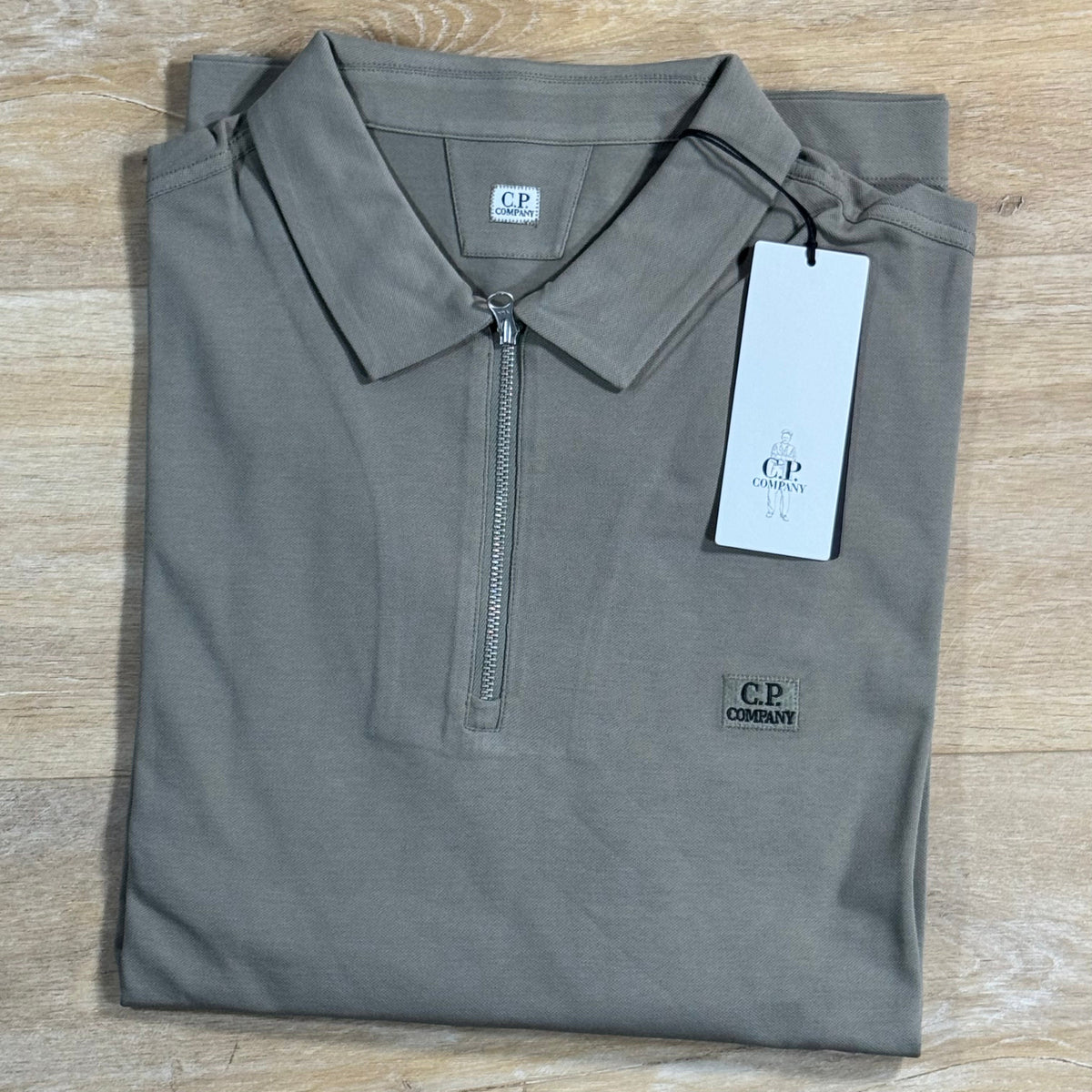 C.P. Company Stretch Piquet Long Sleeve Zip Polo in Fallen Rock - Beige