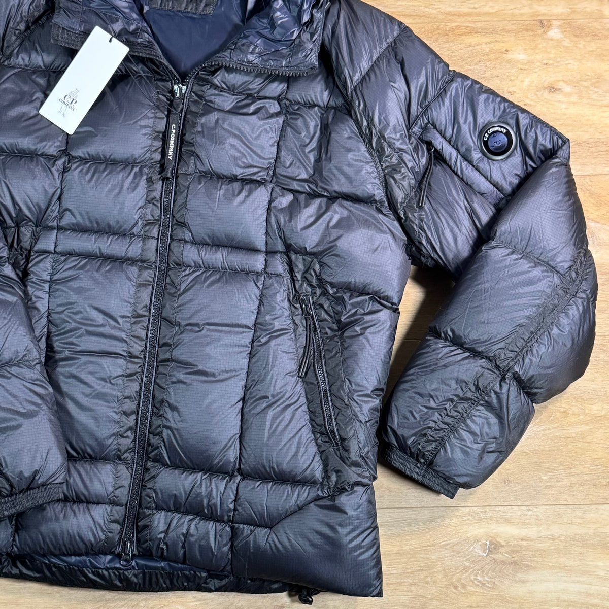 C.P. Company D.D. Shell Lens Puffer Jacket in Navy