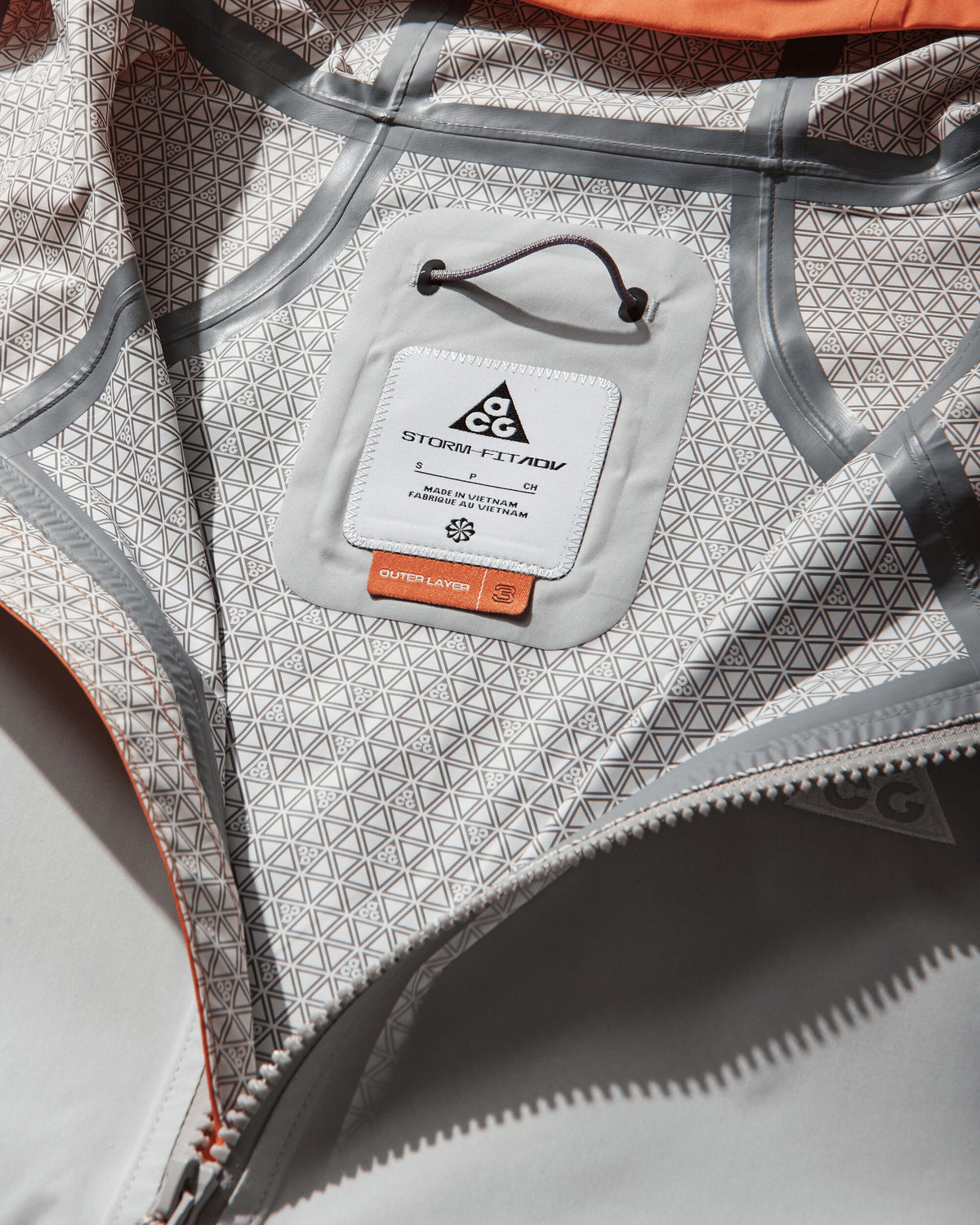 Women's ACG 'Phantazma' Storm-FIT ADV Jacket Safety Orange / Grey Fog