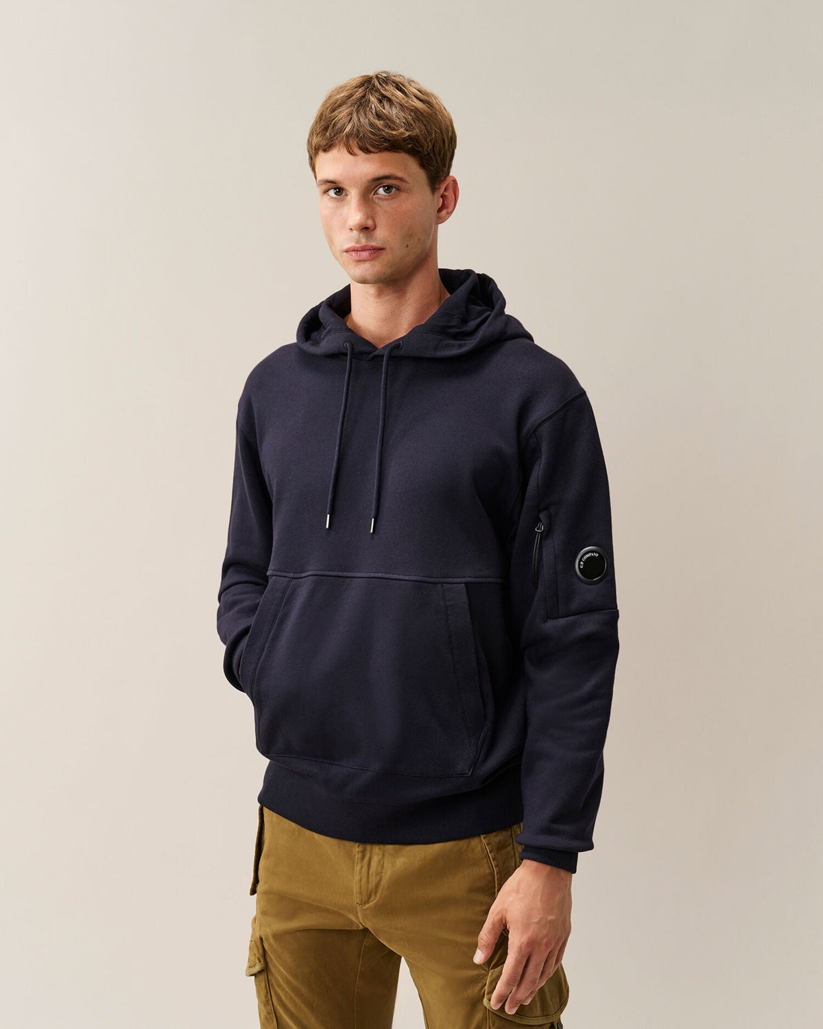 C.P. Company Diagonal Raised Fleece Lens Hoodie in Navy